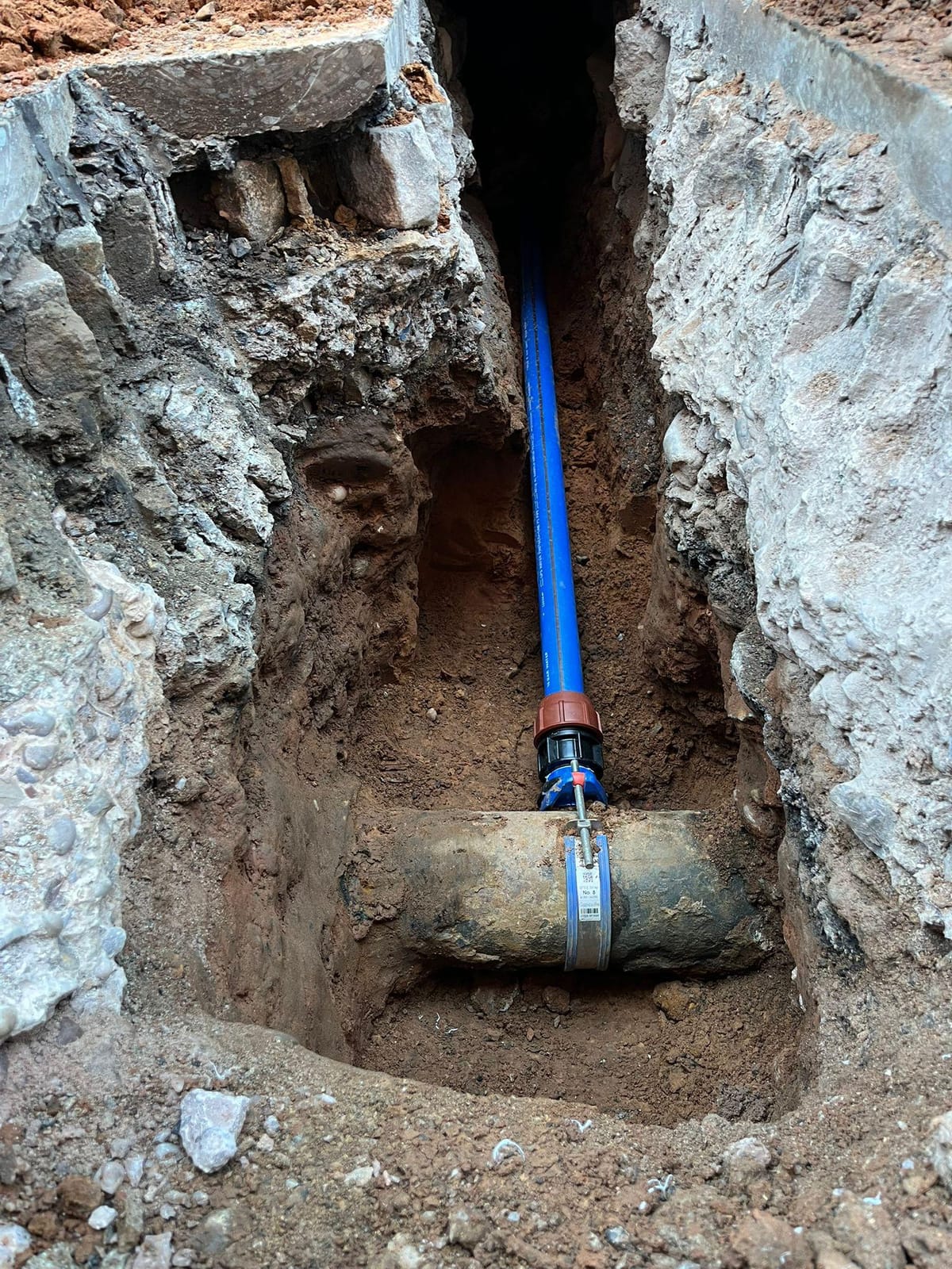 Multi-utility diversion in progress with gas, water, and electricity services installed in a single coordinated trench